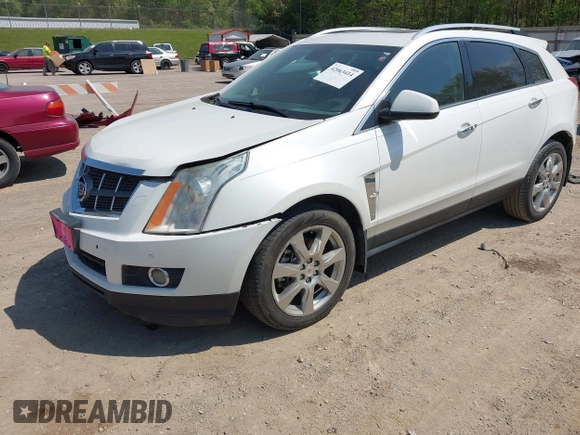 2012 Cadillac SRX Performance Collection z VIN 3GYFNBE39CS628740, wystawiony jako IAAI lot #42063414 z przebiegiem 88 260 mil mil oraz . Historia ofert i sprzedaży dostępna na DreamBid. Obrazek 17.