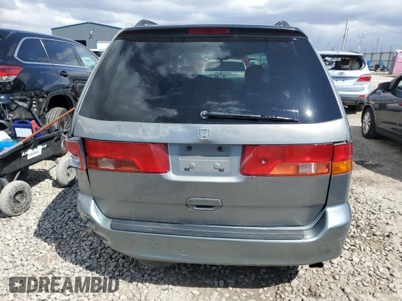 2000 Honda Odyssey EX with VIN 2HKRL1860YH532814, listed as a Copart auction lot 51780855 with 186,328 mi miles and Salvage Title. Bid and sale history available at DreamBid. Image 6.