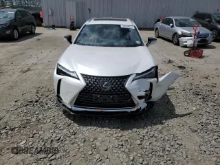 2024 Lexus UX 250h Premium z VIN JTHP9JBH4R2071151, wystawiony jako Copart lot #59289934 z przebiegiem 3 861 mil mil oraz Szkoda całkowita • Salvage title. Historia ofert i sprzedaży dostępna na DreamBid. Obrazek 5.