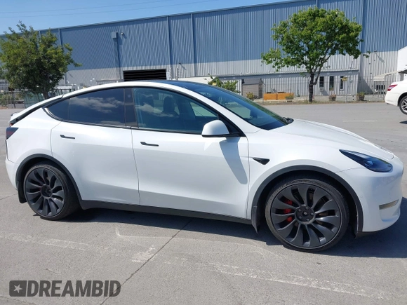 2022 Tesla Model Y Performance z VIN 7SAYGDEF2NF347456, wystawiony jako IAAI lot #42177725 z przebiegiem 29 374 mil mil oraz . Historia ofert i sprzedaży dostępna na DreamBid. Obrazek 14.