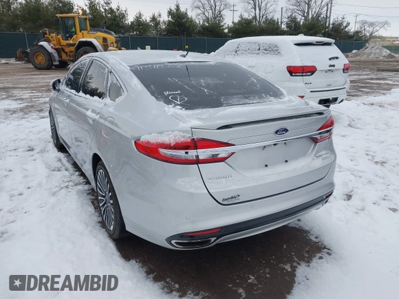 2017 Ford Fusion Titanium with VIN 3FA6P0K91HR117198, listed as a IAAI auction lot 41346552 with 76,951 mi miles. Bid and sale history available at carsss.com. Image 3.