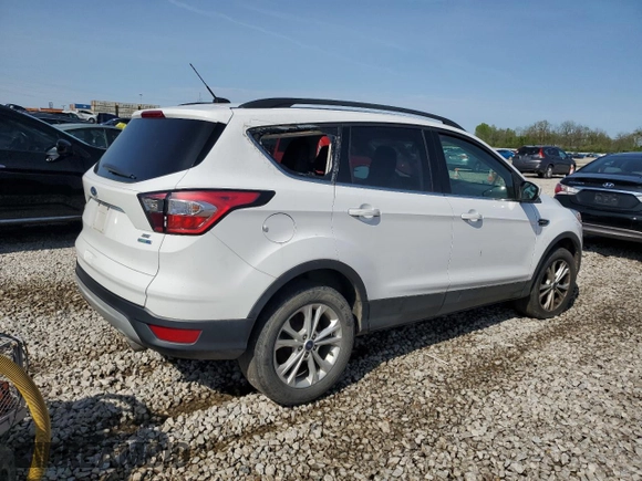 2018 Ford Escape SE z VIN 1FMCU9GD5JUD07359, wystawiony jako Copart lot #55331255 z przebiegiem 142 502 mil mil oraz Czysty tytuł • Clean title. Historia ofert i sprzedaży dostępna na DreamBid. Obrazek 3.