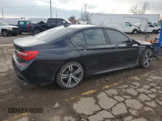 2017 BMW 7 Series with VIN WBA7B0C31HG527138, listed as a Copart auction lot 83545034 with 46,370 mi miles and Clean Title. Bid and sale history available at DreamBid. Image 3.
