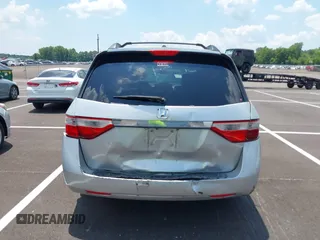 2011 Honda Odyssey Touring with VIN 5FNRL5H99BB058448, listed as a IAAI auction lot 42651432 with 208,581 mi miles and . Bid and sale history available at DreamBid. Image 16.