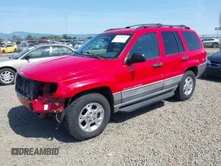 1999 Jeep Grand Cherokee Laredo with VIN 1J4GW58S5XC644757, listed as a IAAI auction lot 42139920 with 192,745 mi miles and . Bid and sale history available at DreamBid. Image 2.
