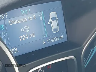 2014 Ford Focus SE with VIN 1FADP3F2XEL315908, listed as a IAAI auction lot 41843004 with 114,203 mi miles. Bid and sale history available at carsss.com. Image 7.