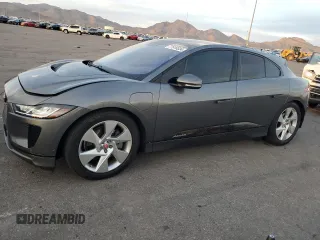 2019 Jaguar I-Pace S z VIN SADHB2S10K1F73211, wystawiony jako Copart lot #77910334 z przebiegiem 66 800 mil mil oraz Tytuł czysty. Historia ofert i sprzedaży dostępna na DreamBid. Obrazek 1.
