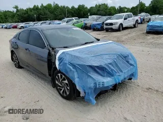 2017 Honda Civic EX z VIN 19XFC2F71HE017068, wystawiony jako Copart lot #53541655 z przebiegiem 148 087 mil mil oraz Szkoda całkowita • Salvage title. Historia ofert i sprzedaży dostępna na DreamBid. Obrazek 14.
