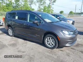 2021 Chrysler Voyager LXi z VIN 2C4RC1DG3MR586863, wystawiony jako IAAI lot #42080575 z przebiegiem 40 392 mil mil oraz . Historia ofert i sprzedaży dostępna na DreamBid. Obrazek 1.