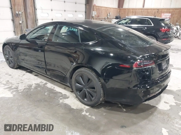 2022 Tesla Model S with VIN 5YJSA1E58NF478403, listed as a IAAI auction lot 41533099 with 42,779 mi miles and . Bid and sale history available at DreamBid. Image 3.