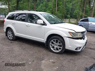 2015 Dodge Journey SXT with VIN 3C4PDCCG2FT690956, listed as a IAAI auction lot 42515701 with 145,676 mi miles and . Bid and sale history available at DreamBid. Image 1.