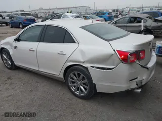 2013 Chevrolet Malibu LTZ with VIN 1G11H5SA7DF127467, listed as a IAAI auction lot 41192477 with 138,344 mi miles. Bid and sale history available at carsss.com. Image 3.