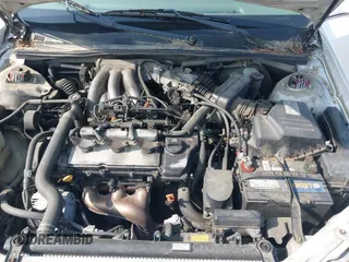 2000 Toyota Avalon XL z VIN 4T1BF28B2YU102103, wystawiony jako IAAI lot #42441529 z przebiegiem 256 568 mil mil oraz . Historia ofert i sprzedaży dostępna na DreamBid. Obrazek 10.