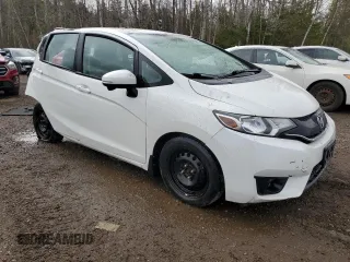 2015 Honda Fit EX-L z VIN 3HGGK5H84FM107978, wystawiony jako Copart lot #54879335 z przebiegiem 193 583 mil mil oraz Nie do naprawy • Non repairable. Historia ofert i sprzedaży dostępna na DreamBid. Obrazek 4.