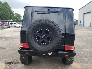 2014 Mercedes-Benz G-Class G 550 with VIN WDCYC3HF2EX214663, listed as a Copart auction lot 62703594 with 104,644 mi miles and Salvage Title. Bid and sale history available at carsss.com. Image 6.