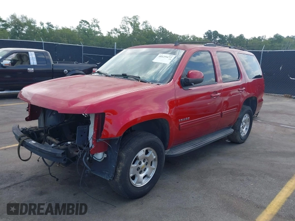 2013 Chevrolet Tahoe LS with VIN 1GNSCAE00DR359498, listed as a IAAI auction lot 40125477 with 156,100 mi miles and . Bid and sale history available at DreamBid. Image 2.