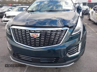 2024 Cadillac XT5 FWD Premium Luxury with VIN 1GYKNCR45RZ733939, listed as a IAAI auction lot 41224515 with 6,945 mi miles. Bid and sale history available at carsss.com. Image 6.