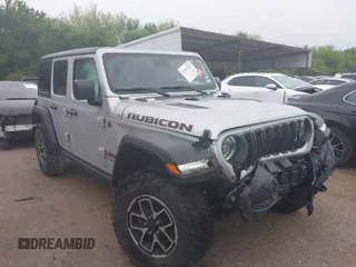 2024 Jeep Wrangler Rubicon with VIN 1C4PJXFG7RW252959, listed as a IAAI auction lot 41955302 with 27,727 mi miles. Bid and sale history available at carsss.com. Image 1.