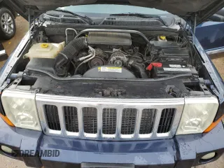 2010 Jeep Commander Sport with VIN 1J4RG4GK5AC119433, listed as a Copart auction lot 87657265 with 212,973 mi miles and Salvage title. Bid and sale history available at DreamBid. Image 12.