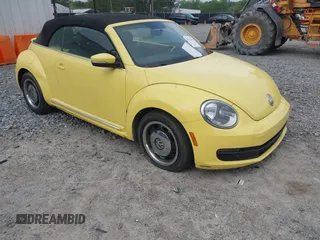 2013 Volkswagen Beetle 2.5L with VIN 3VW5P7AT1DM802091, listed as a IAAI auction lot 41947850 with 92,937 mi miles and . Bid and sale history available at DreamBid. Image 1.