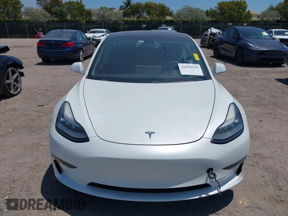2018 Tesla Model 3 Long Range Battery with VIN 5YJ3E1EAXJF027179, listed as a IAAI auction lot 42059918 with 43,566 mi miles. Bid and sale history available at carsss.com. Image 13.