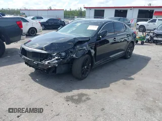 2013 Kia Optima SX with VIN 5XXGR4A61DG100479, listed as a IAAI auction lot 42376261 with 201,615 mi miles and . Bid and sale history available at DreamBid. Image 2.
