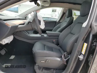 2024 Tesla Model Y with VIN 7SAYGDED2RF040079, listed as a Copart auction lot 57237054 with 2,549 mi miles and Non Repairable. Bid and sale history available at DreamBid. Image 7.