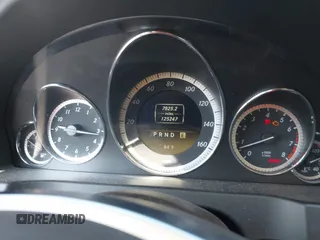 2012 Mercedes-Benz E 550 with VIN WDDKJ7DB5CF150395, listed as a IAAI auction lot 42673196 with 125,247 mi miles and . Bid and sale history available at DreamBid. Image 7.