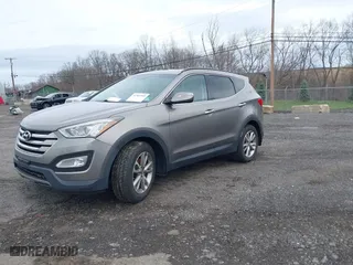 2014 Hyundai Santa Fe Sport with VIN 5XYZUDLA7EG217912, listed as a IAAI auction lot 41963565 with 134,718 mi miles. Bid and sale history available at carsss.com. Image 17.