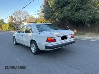 1992 Mercedes-Benz 400 with VIN WDBEA34E4NB705887, listed as a Copart auction lot 48637485 with 76,661 mi miles and Clean Title. Bid and sale history available at carsss.com. Image 3.