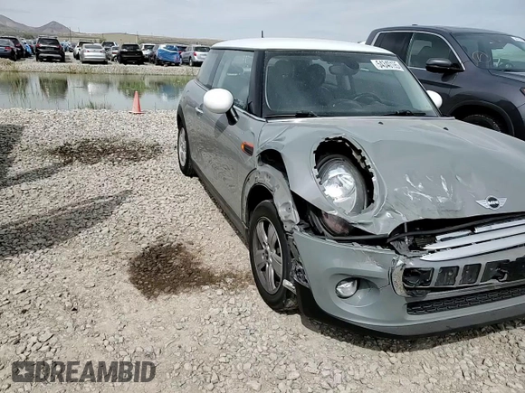 2015 MINI Hardtop with VIN WMWXM5C53FT941132, listed as a Copart auction lot 54340195 with 127,520 mi miles and Salvage title. Bid and sale history available at DreamBid. Image 13.