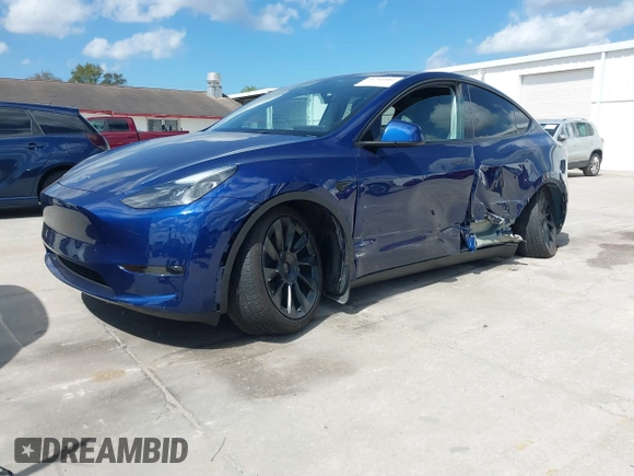 2023 Tesla Model Y Long Range with VIN 7SAYGDEE9PA205757, listed as a IAAI auction lot 41705881 with 18,567 mi miles and . Bid and sale history available at carsss.com. Image 17.