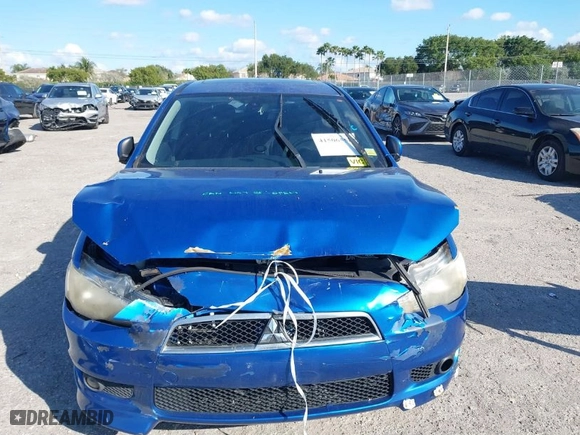 2010 Mitsubishi Lancer GTS with VIN JA32X8HW4AU004864, listed as a IAAI auction lot 41506558 with 141,514 mi miles. Bid and sale history available at carsss.com. Image 6.