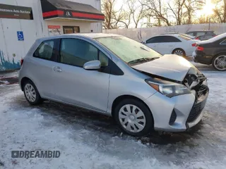 2015 Toyota Yaris L with VIN VNKJTUD36FA036518, listed as a IAAI auction lot 41233406 with 138,481 mi miles. Bid and sale history available at carsss.com. Image 1.