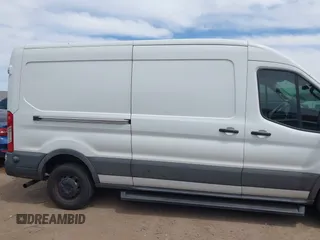 2020 Ford Transit Cargo with VIN 1FTBR1CG8LKA69072, listed as a IAAI auction lot 42386271 with Not provided miles and . Bid and sale history available at DreamBid. Image 13.