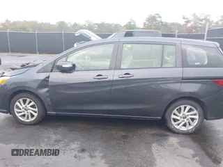 2015 Mazda 5 Sport with VIN JM1CW2BL3F0188052, listed as a IAAI auction lot 40777036 with 69,405 mi miles. Bid and sale history available at carsss.com. Image 14.