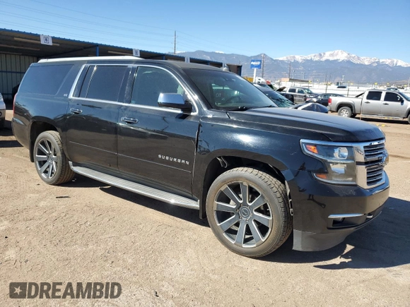 2015 Chevrolet Suburban LTZ with VIN 1GNSKKKC2FR634654, listed as a Copart auction lot 50337415 with 150,255 mi miles and Salvage Title. Bid and sale history available at DreamBid. Image 4.