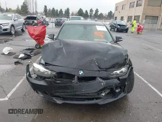 2015 BMW 3 Series 328i with VIN WBA3A5G51FNS83378, listed as a IAAI auction lot 41719392 with 114,146 mi miles. Bid and sale history available at carsss.com. Image 12.