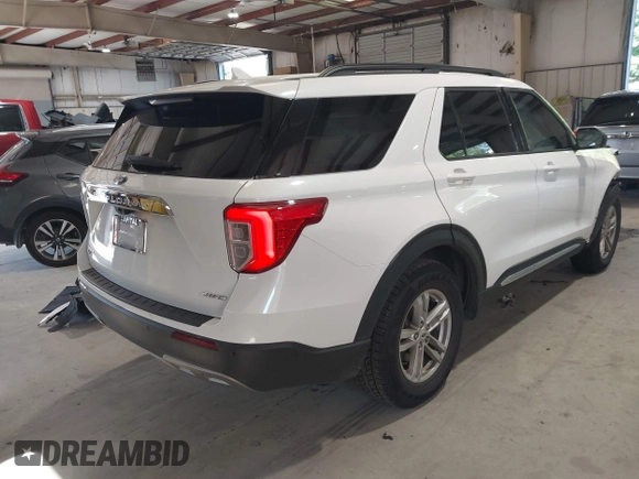 2022 Ford Explorer XLT with VIN 1FMSK8DH6NGB73436, listed as a IAAI auction lot 42605319 with 82,680 mi miles and . Bid and sale history available at DreamBid. Image 4.