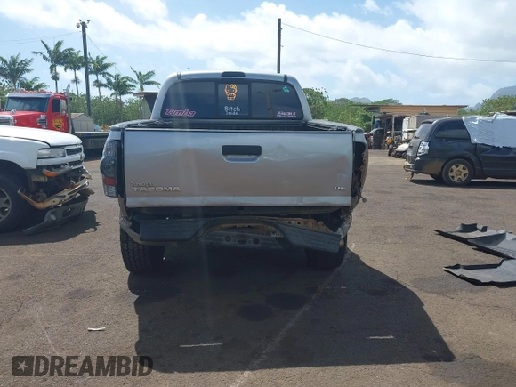 2014 Toyota Tacoma with VIN 3TMLU4EN3EM159080, listed as a IAAI auction lot 41809259 with 113,950 mi miles and . Bid and sale history available at DreamBid. Image 16.