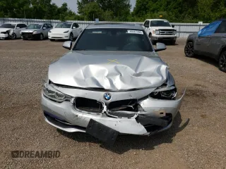 2018 BMW 3 Series 330i xDrive with VIN WBA8D9C54JEM34426, listed as a Copart auction lot 60487205 with 158,224 mi miles and Salvage title. Bid and sale history available at DreamBid. Image 5.