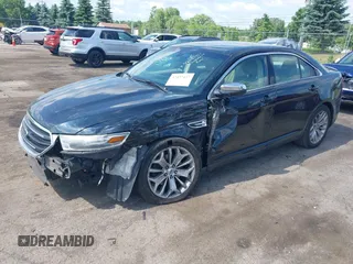 2014 Ford Taurus Limited z VIN 1FAHP2F85EG125118, wystawiony jako IAAI lot #42457437 z przebiegiem 129 406 mil mil oraz . Historia ofert i sprzedaży dostępna na DreamBid. Obrazek 17.