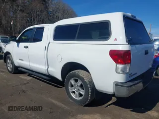 2010 Toyota Tundra 4WD Truck with VIN 5TFUM5F10AX015321, listed as a IAAI auction lot 41687601 with 117,939 mi miles. Bid and sale history available at carsss.com. Image 3.