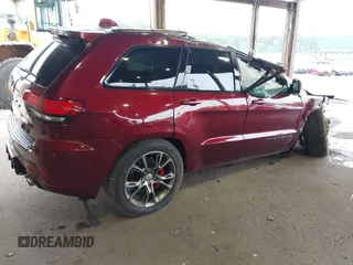 2018 Jeep Grand Cherokee SRT z VIN 1C4RJFDJ0JC231510, wystawiony jako IAAI lot #42445896 z przebiegiem 85 000 mil mil oraz . Historia ofert i sprzedaży dostępna na DreamBid. Obrazek 4.