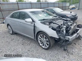 2019 Cadillac XTS Luxury with VIN 2G61M5S31K9137814, listed as a IAAI auction lot 42144205 with 115,776 mi miles and . Bid and sale history available at carsss.com. Image 1.