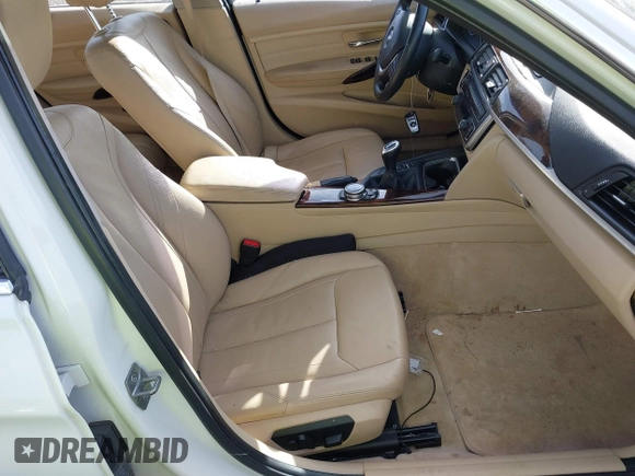 2014 BMW 3 Series 335i xDrive with VIN WBA3B9C52EJ466045, listed as a IAAI auction lot 41281384 with 136,329 mi miles. Bid and sale history available at carsss.com. Image 5.
