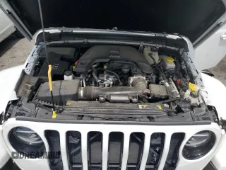 2021 Jeep Wrangler Unlimited Sahara Altitude with VIN 1C4HJXEG1MW586273, listed as a Copart auction lot 61723485 with 76,236 mi miles and Salvage title. Bid and sale history available at DreamBid. Image 12.