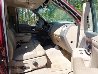 2006 Ford F-150 XLT with VIN 1FTPW14506FB81826, listed as a IAAI auction lot 42142287 with 136,768 mi miles. Bid and sale history available at carsss.com. Image 5.