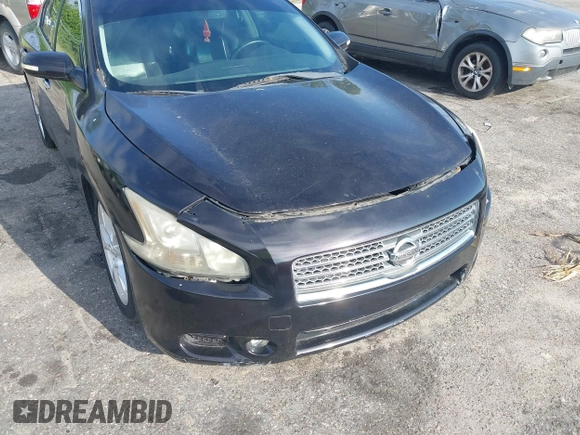 2014 Nissan Maxima S z VIN 1N4AA5AP7EC474825, wystawiony jako IAAI lot #42632041 z przebiegiem 89 627 mil mil oraz . Historia ofert i sprzedaży dostępna na DreamBid. Obrazek 6.