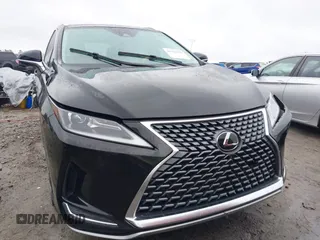 2021 Lexus RX with VIN 2T2HZMAA0MC201749, listed as a IAAI auction lot 41426758 with 148,064 mi miles. Bid and sale history available at carsss.com. Image 12.